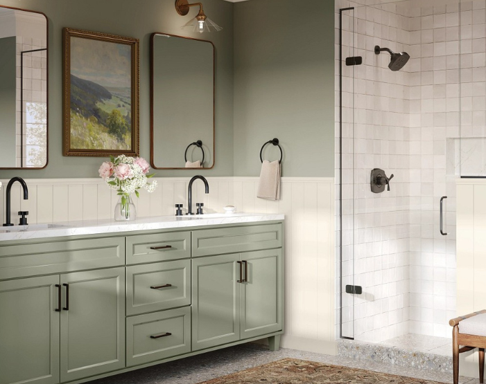 Green vanity cabinets in a bathroom